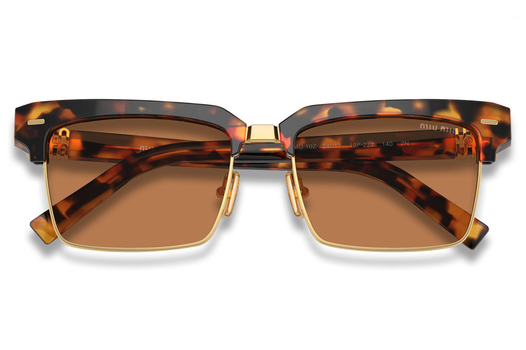 Miu Miu - MU 10ZS Sunglasses Transparent Caramel with Pink Lenses (15T1D0)