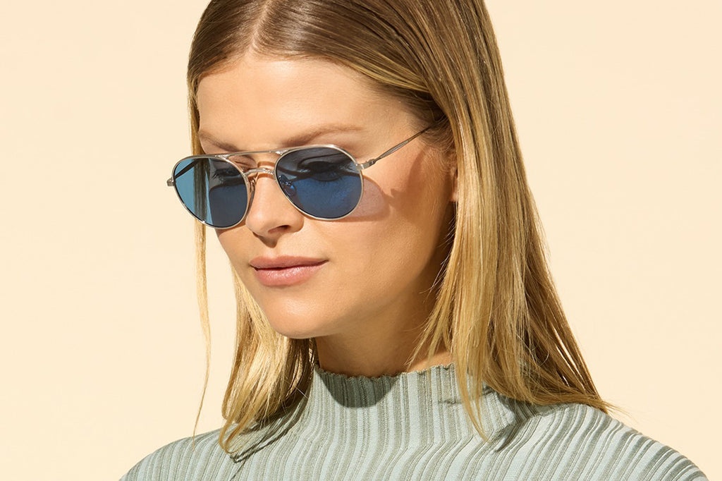 Brushed Brilliant Silver with Semi-Flat Pure Sapphire Lenses