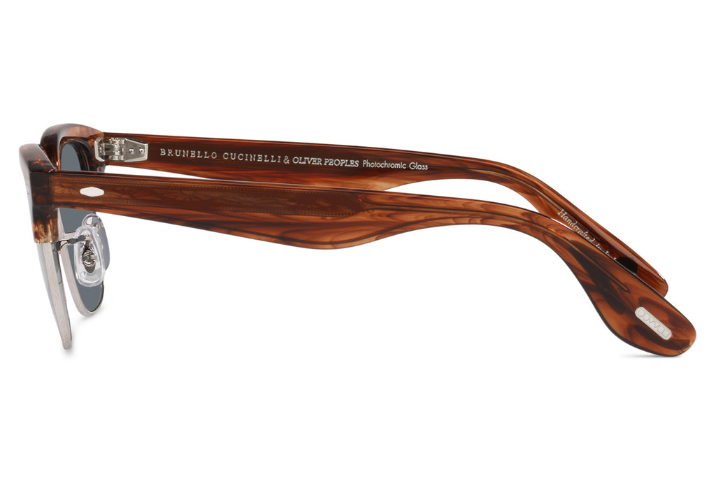 Oliver Peoples - Capannelle (OV5486S) Sunglasses Dark Amber Smoke/Silver with Indigo Photochromic